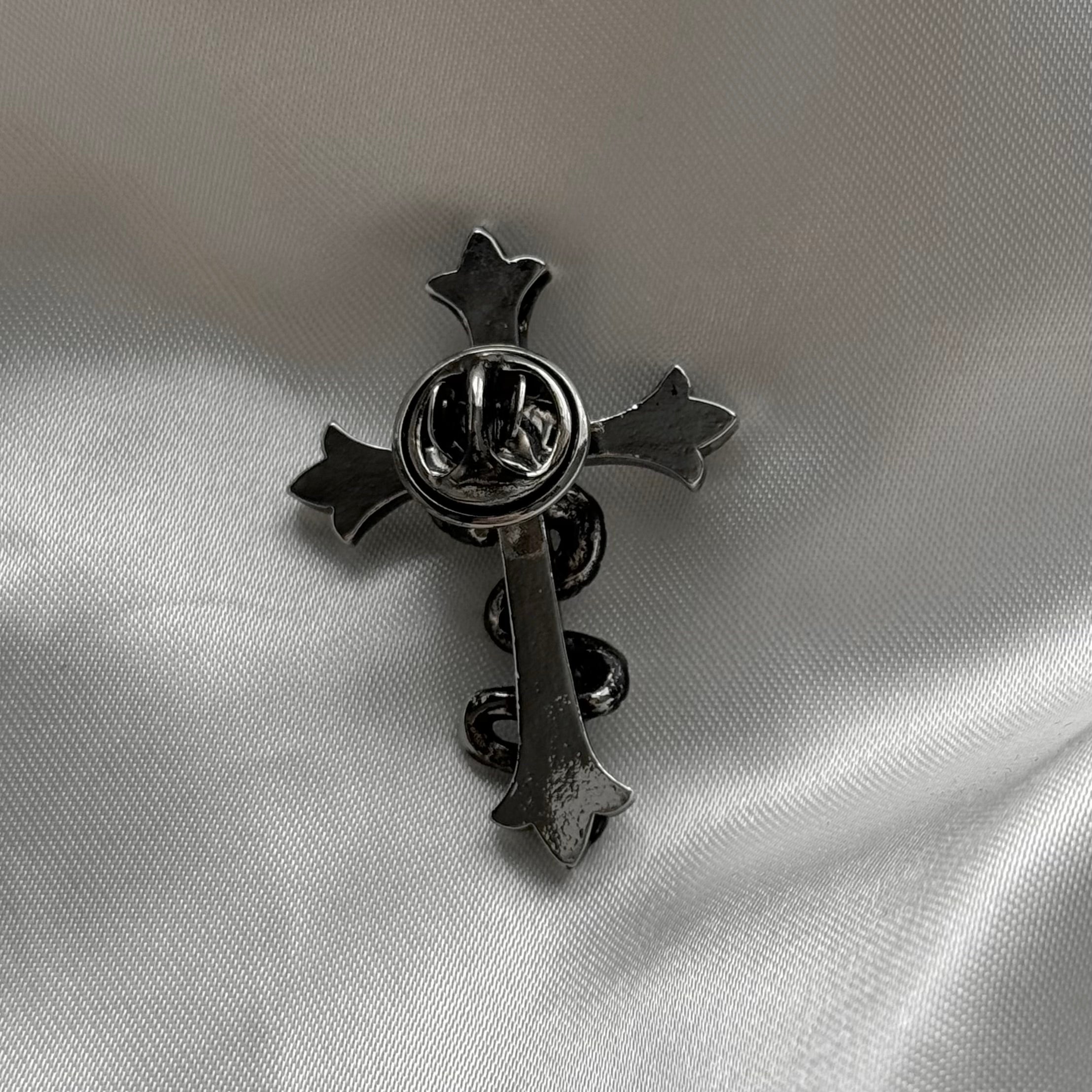 gibous snake cross pin badge