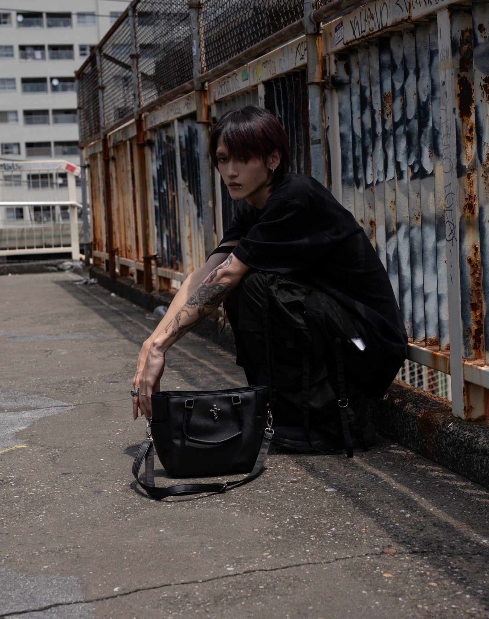 gibous snake cross multi pocket bag
