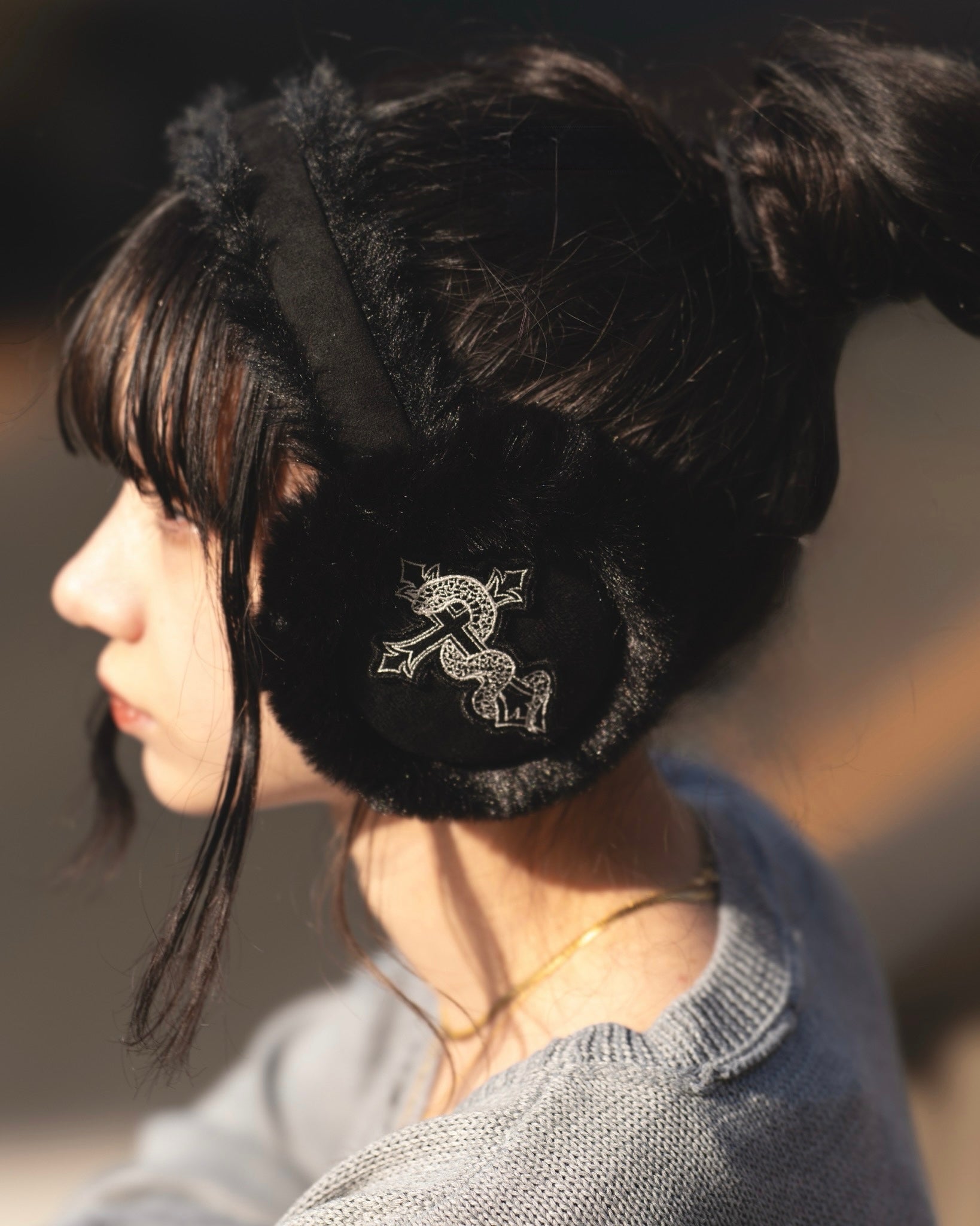 gibous snake cross black fur earflap