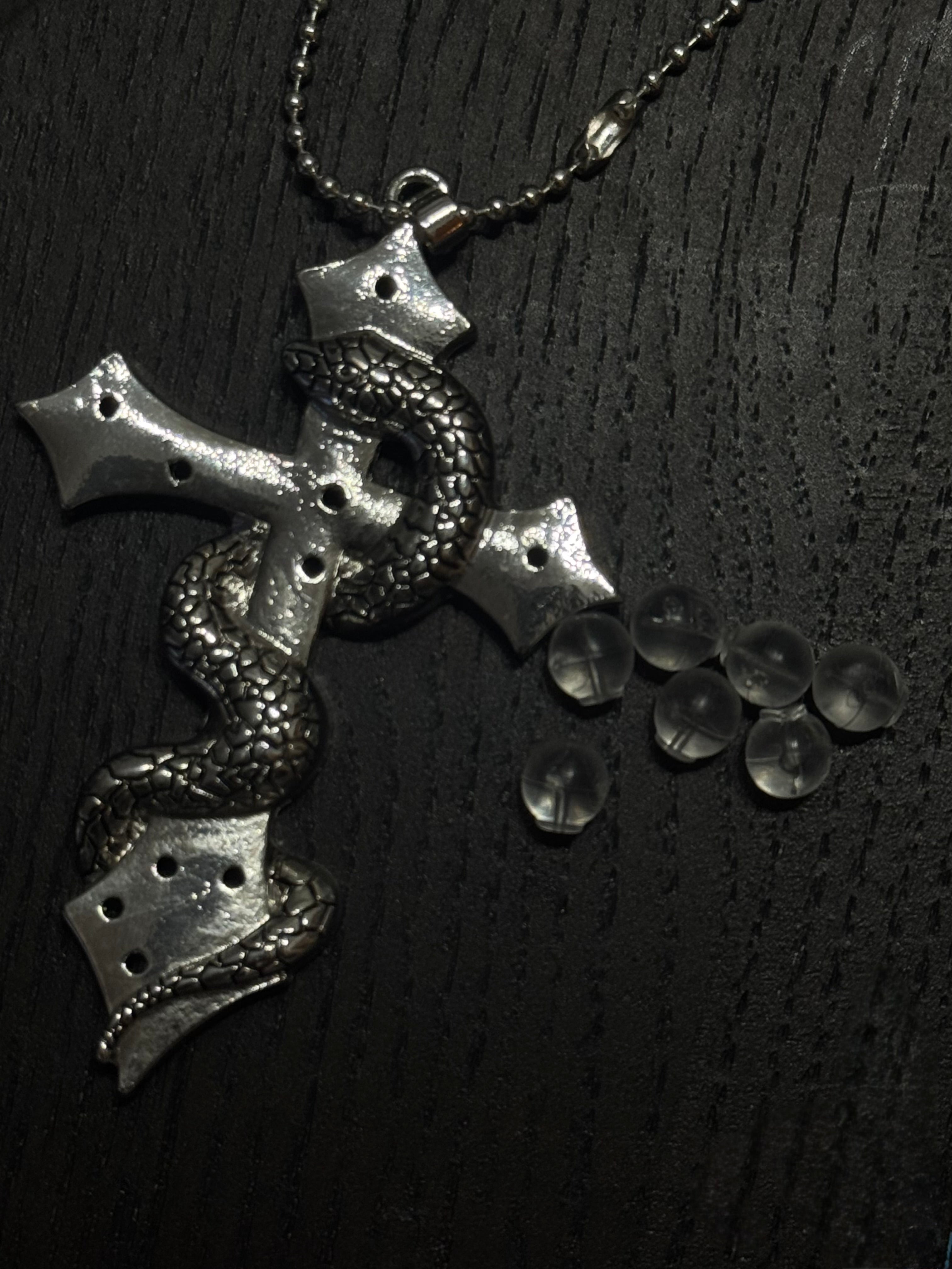 gibous snake cross pierce stock necklace silver