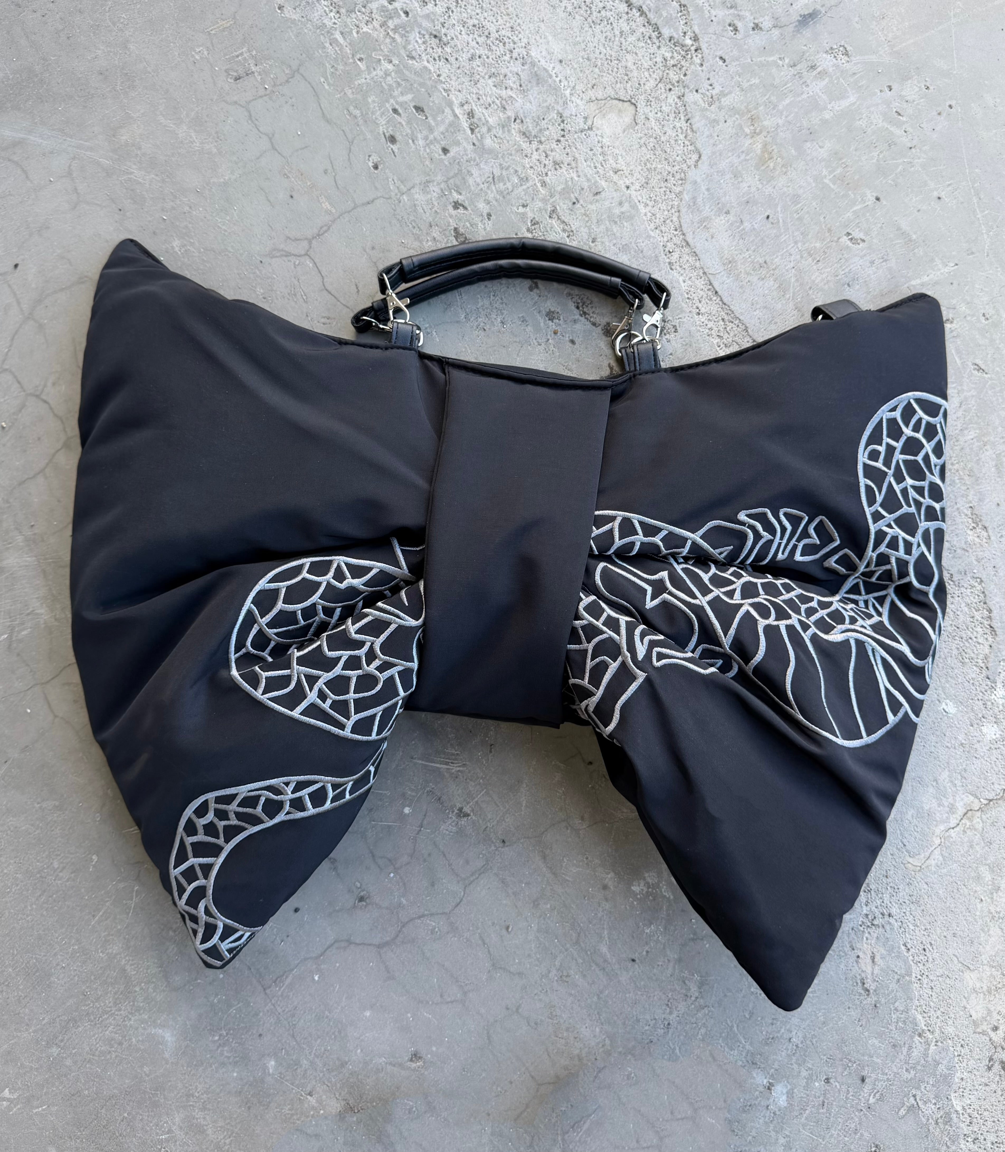 gibous snake scorpion ribbon bag