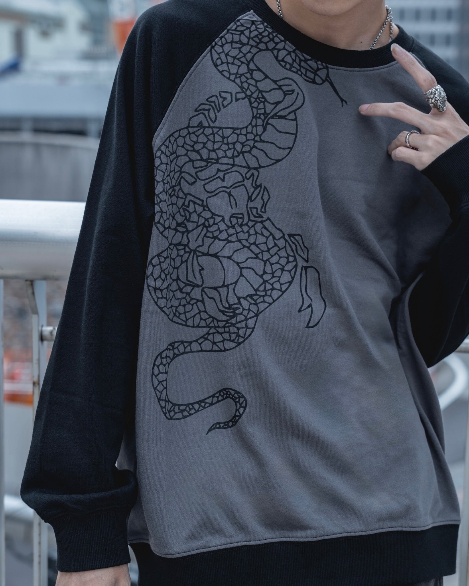 gibous snake scorpion raglan sweatshirt