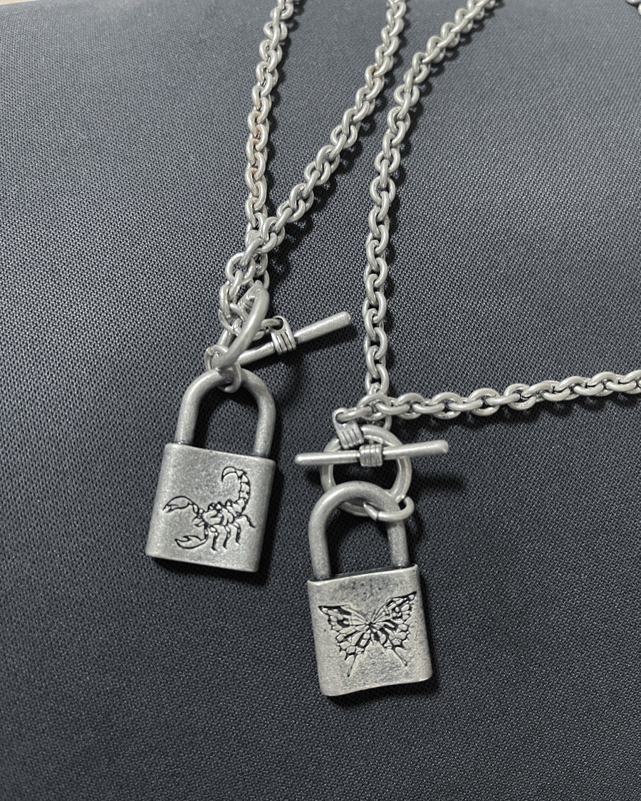 gibous butterfly lock necklace