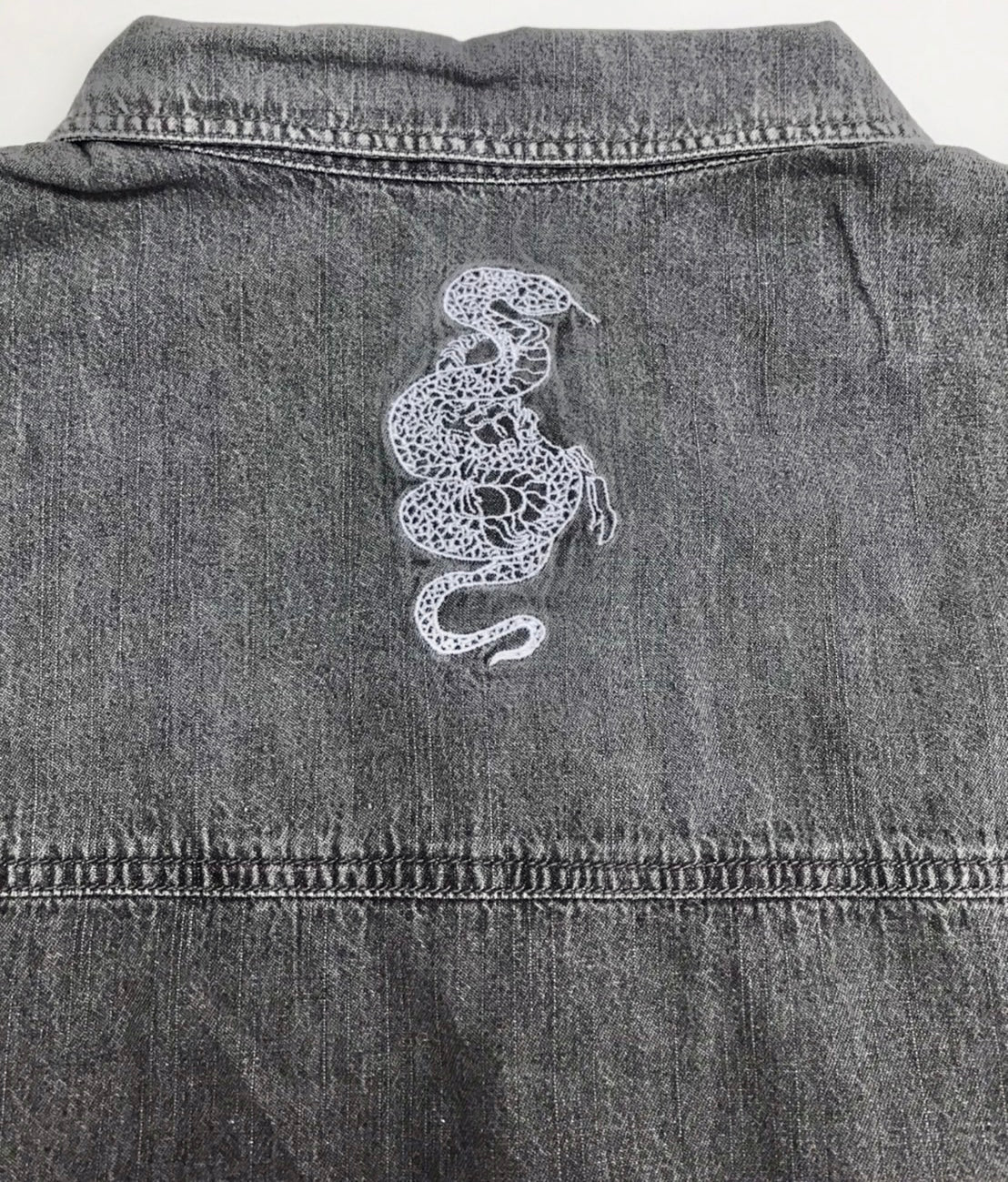 gibous snake scorpion denim vest