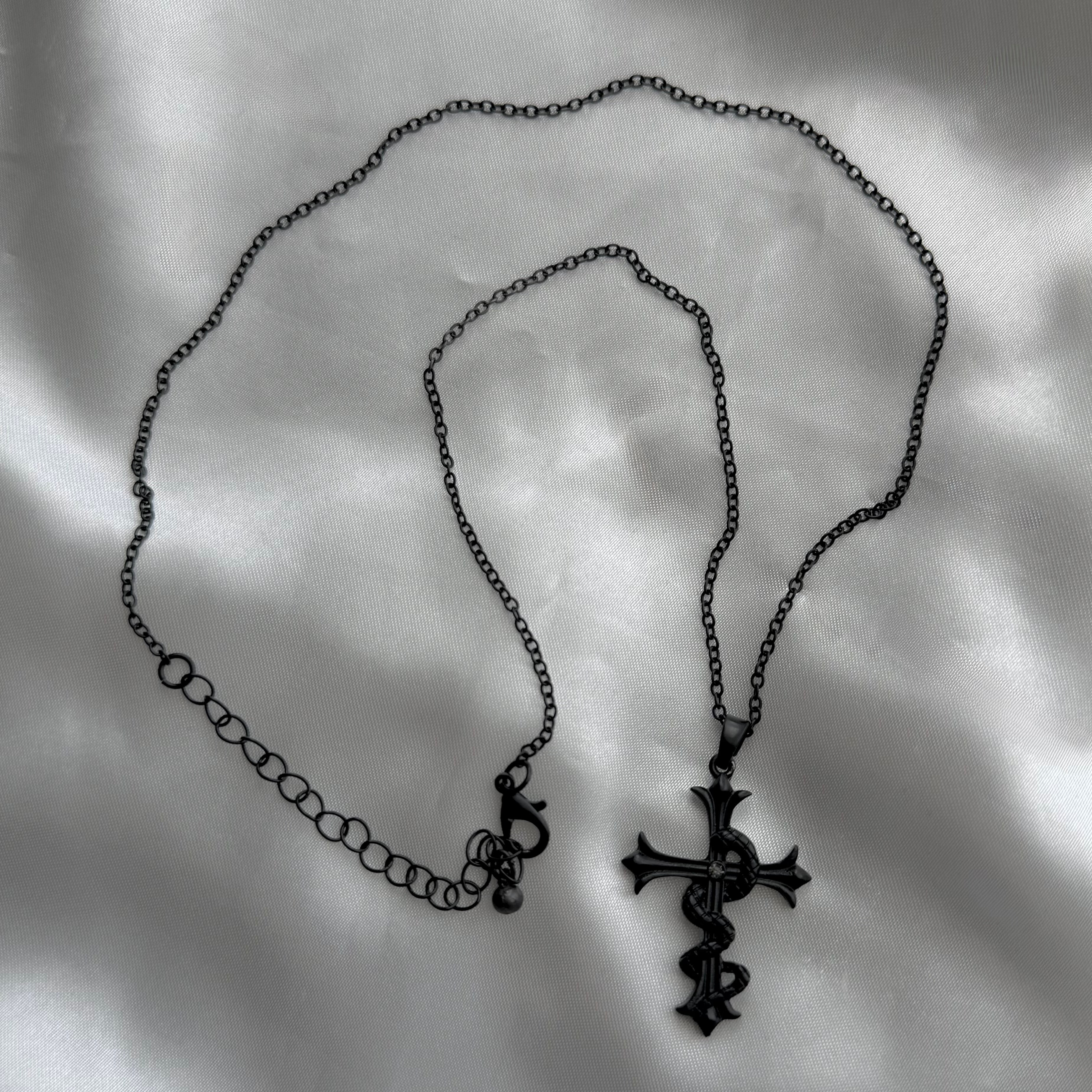 gibous snake cross necklace black