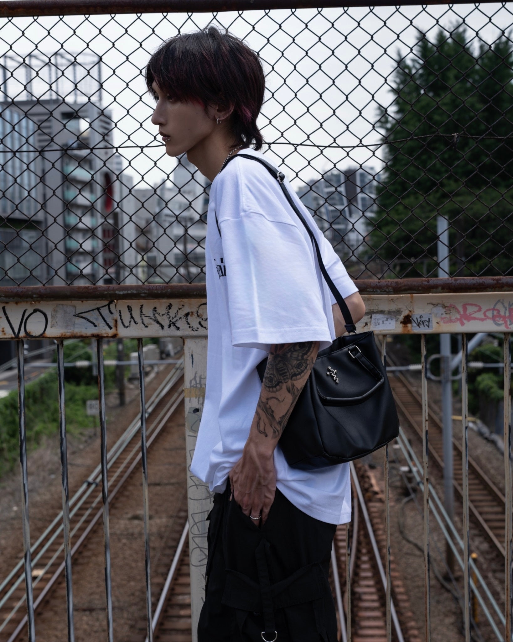 gibous snake cross multi pocket bag