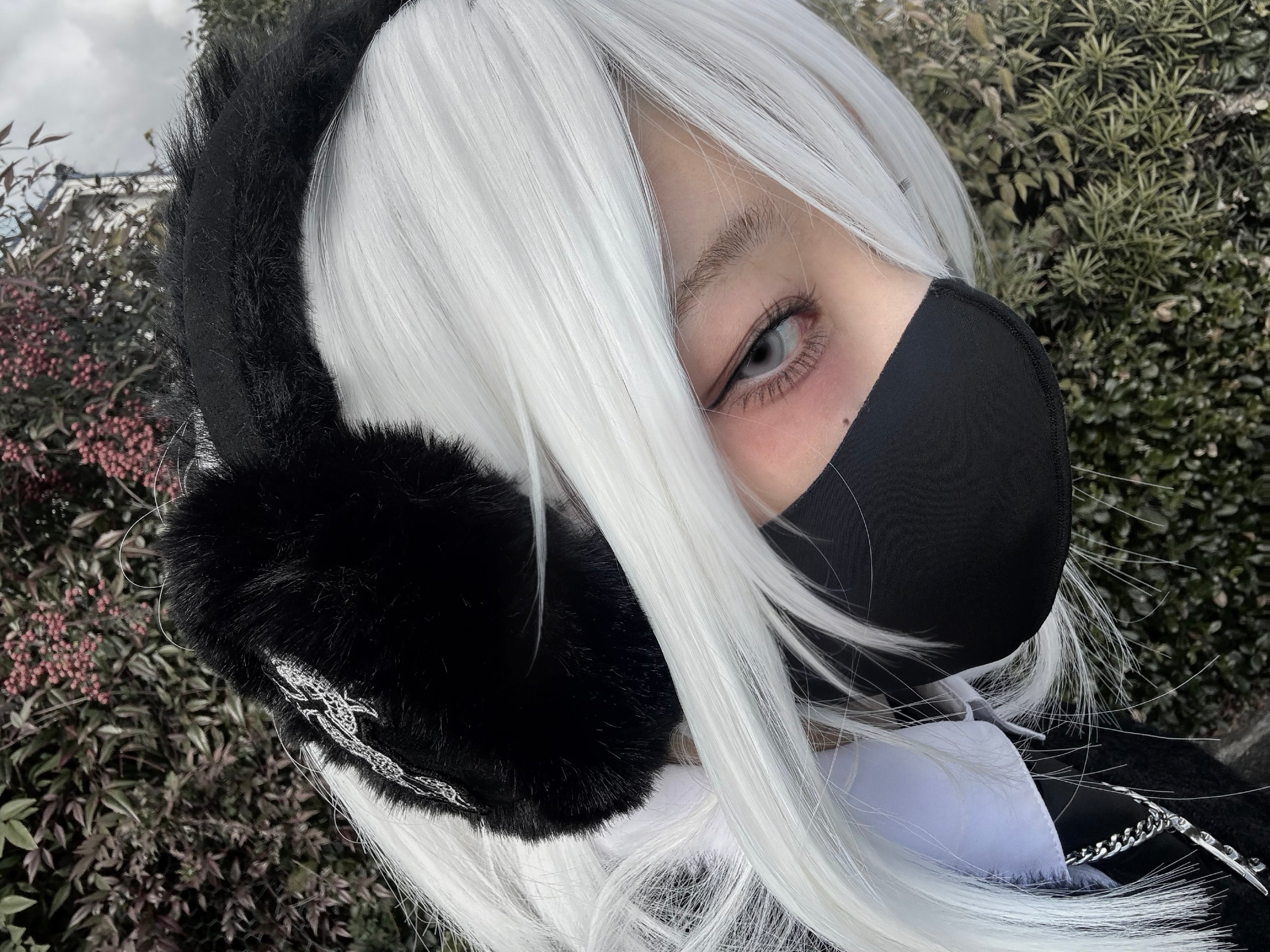 gibous snake cross black fur earflap