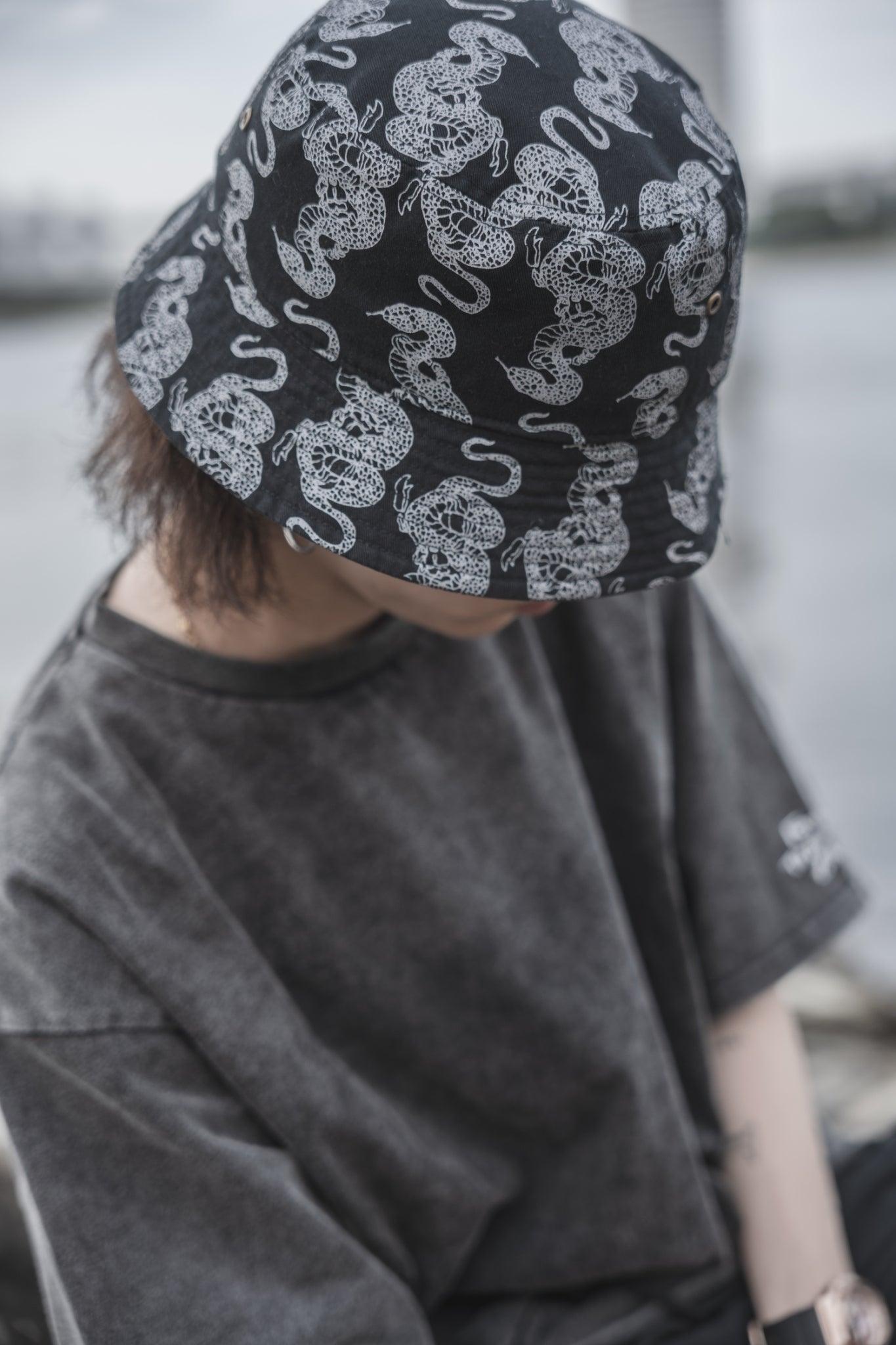 gibous snake scorpion pattern bucket hat