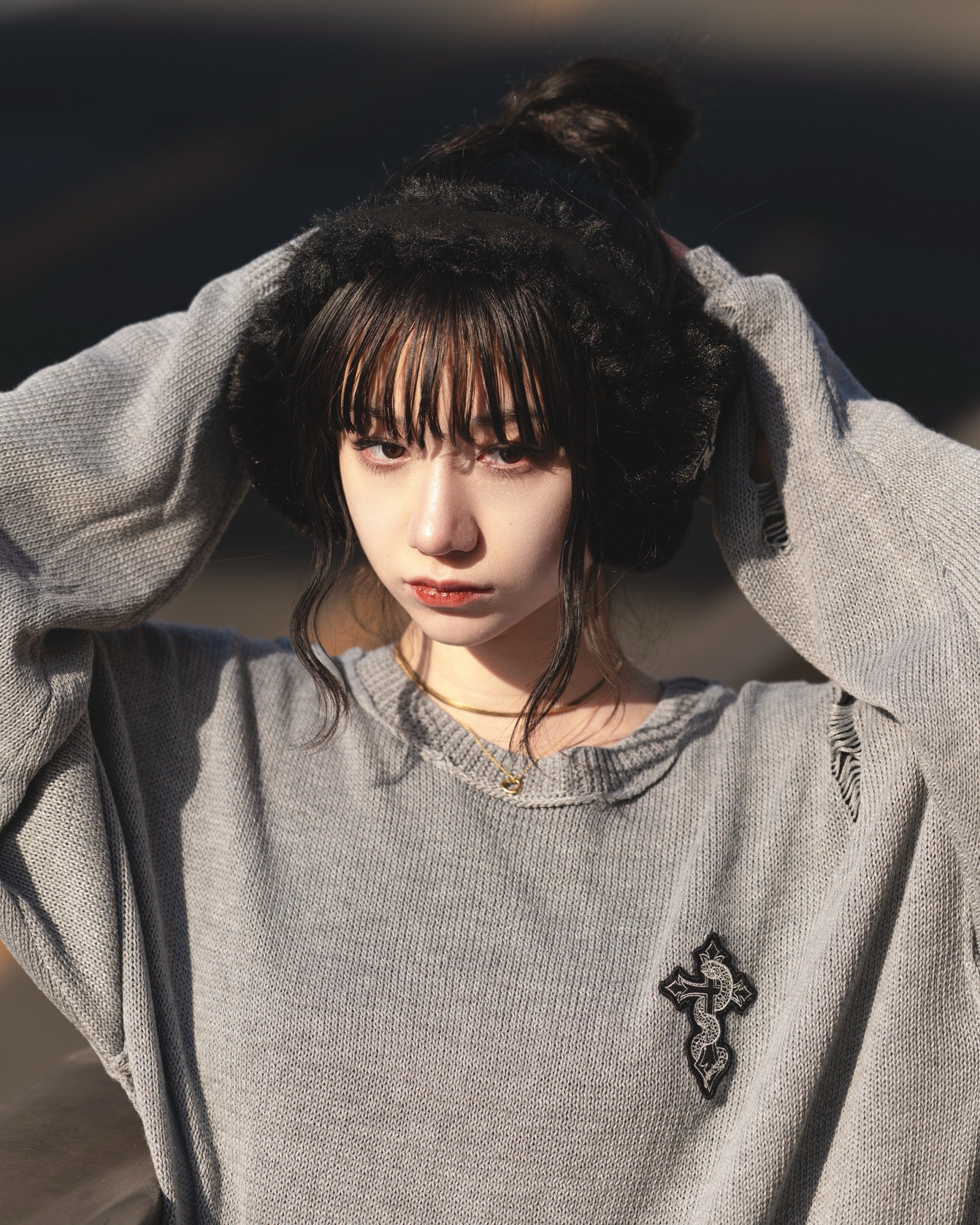 gibous snake cross black fur earflap