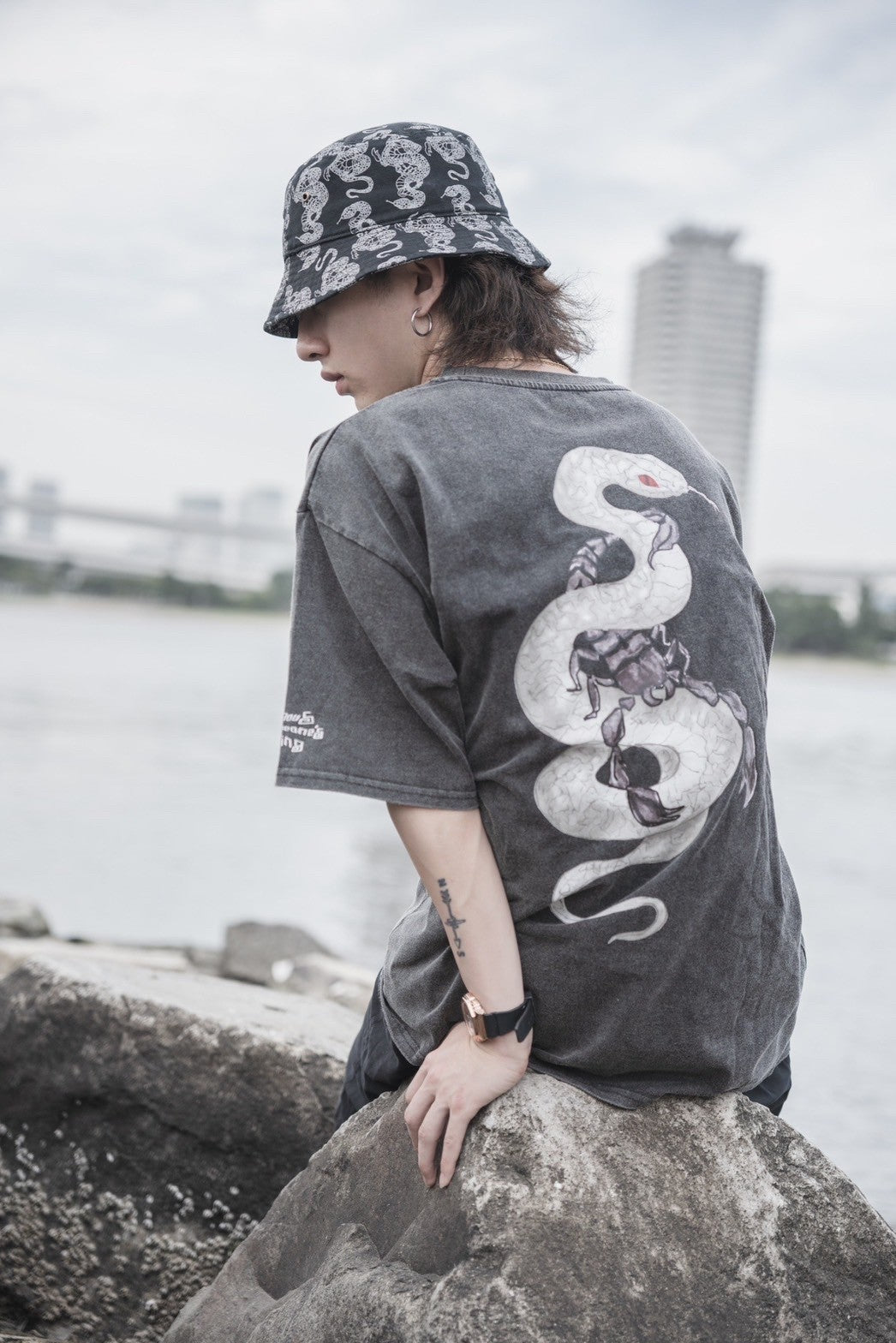 gibous snake scorpion pattern bucket hat