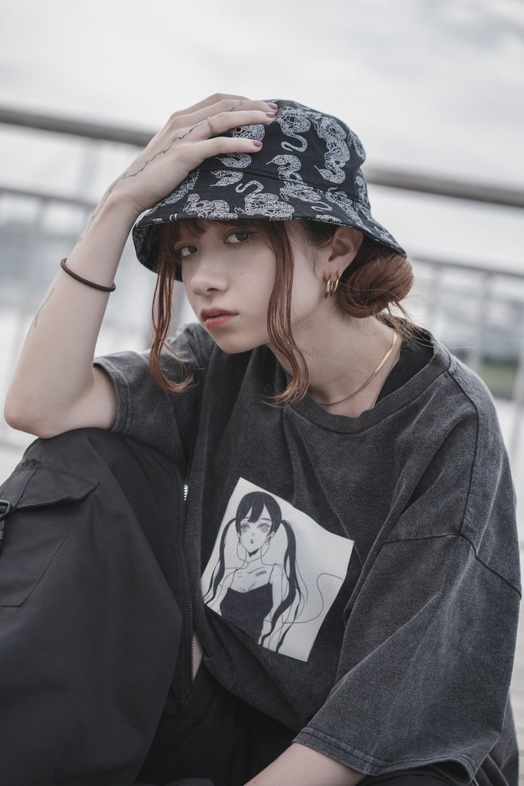 gibous snake scorpion pattern bucket hat