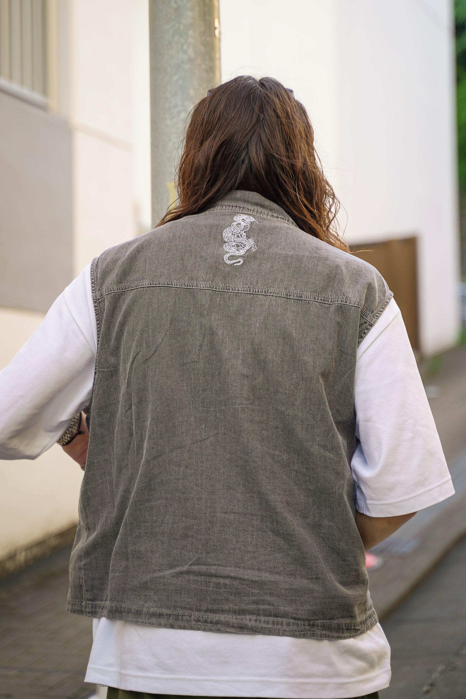 gibous snake scorpion denim vest