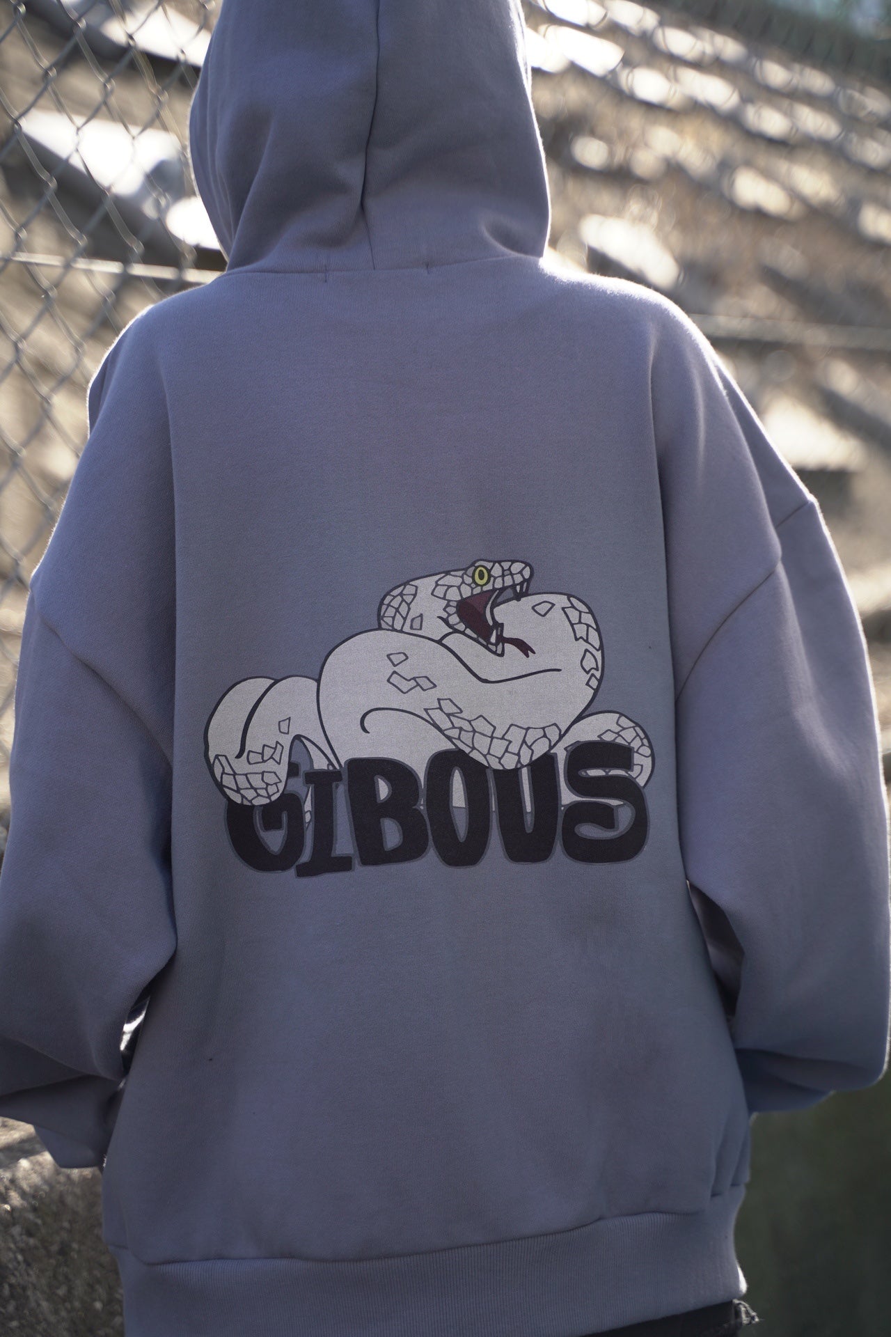 gibous snake logo parker blue