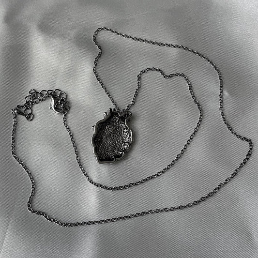 gibous snake heart necklace